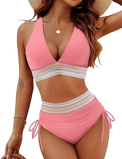 Woman wearing a pink bikini with a white and gray striped waistband on a white background