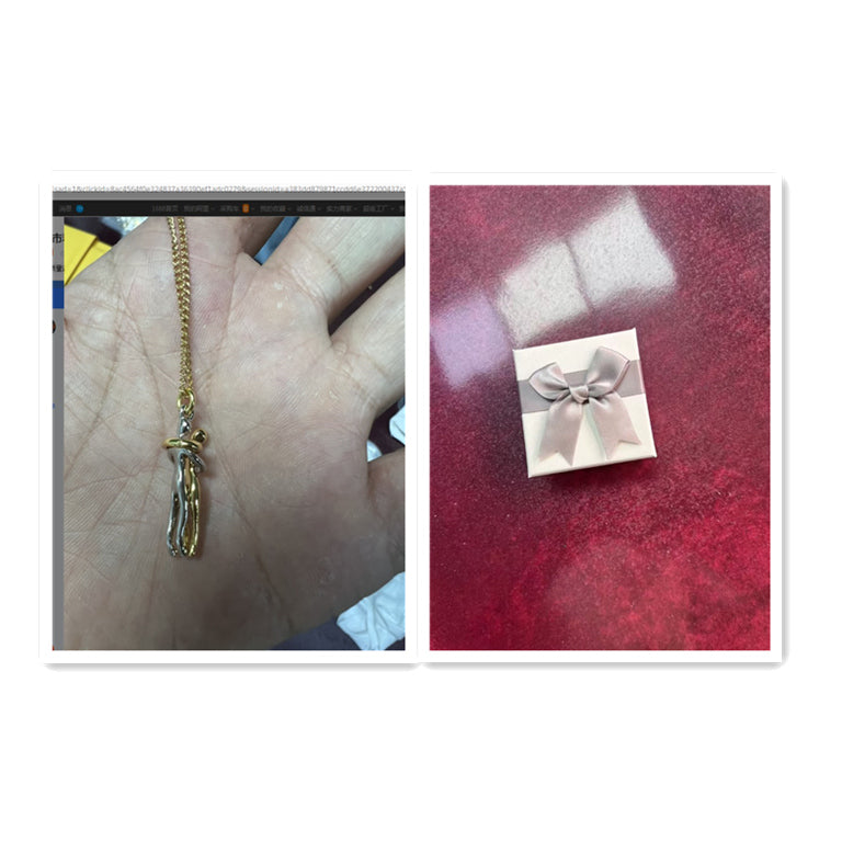 Gold love hug pendant necklace on hand with gift box