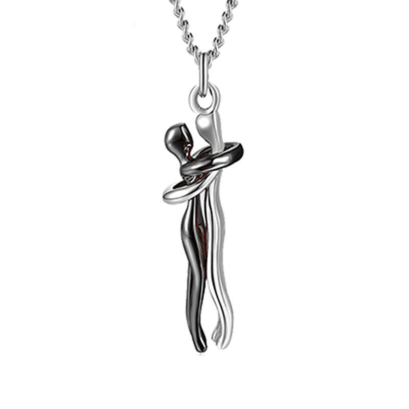 Black and silver hug pendant necklace with interlocking figure charm on chain