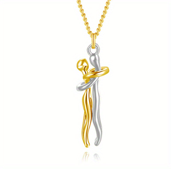 Gold and silver-tone love hug pendant necklace with clasped figure, gold chain