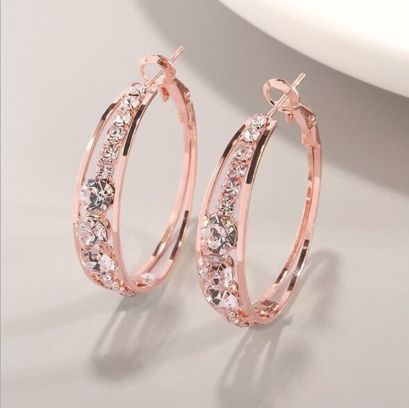Rose gold hoop earrings with pavé mosaic stone pattern and hinged backs