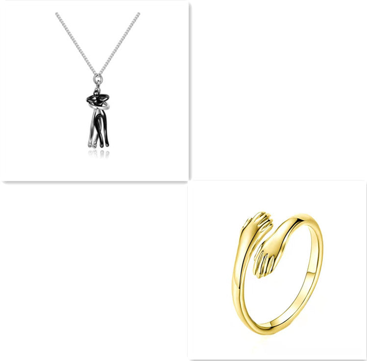Black and silver love hug pendant necklace with hugging couple charm and chain