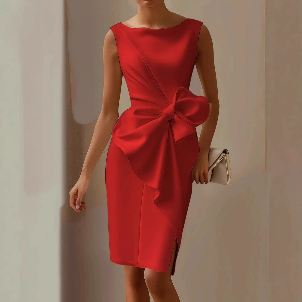 Red dress with a large bow detail on a neutral background