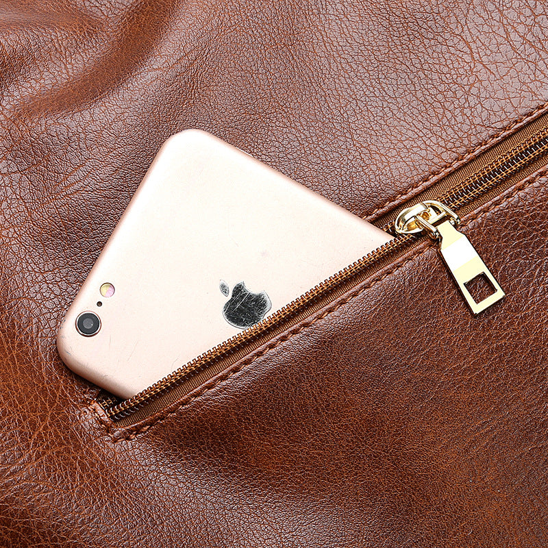 Brown leather-texture bucket bag with gold zipper and phone in front pocket