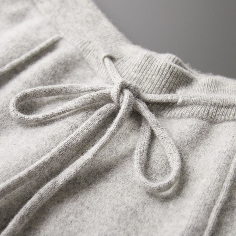 Soft gray drawstring waistband on cozy sweatpants, perfect for casual wear and everyday comfort.