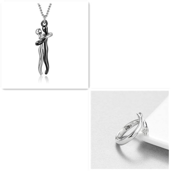 Silver hug pendant necklace and silver ring set with interlocking figure charm