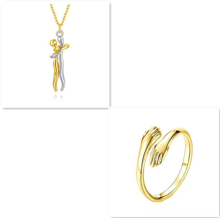 Gold love hug pendant necklace with matching gold tone ring