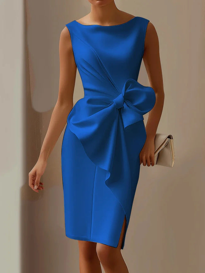 Blue dress with a large bow detail on a neutral background