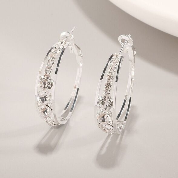 Silver-tone hoop earrings with pavé mosaic stones and hinged backs