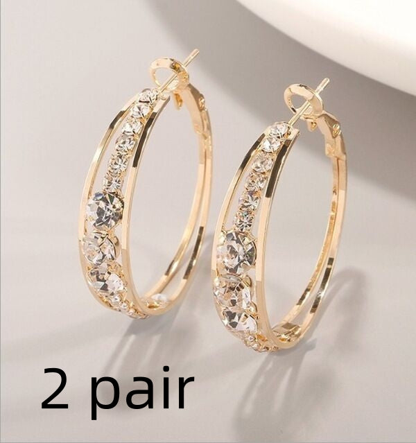 Gold-tone hoop earrings with pavé mosaic stones and hinged backs