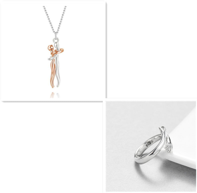 Rose gold love hug pendant necklace with clasped figures, silver chain